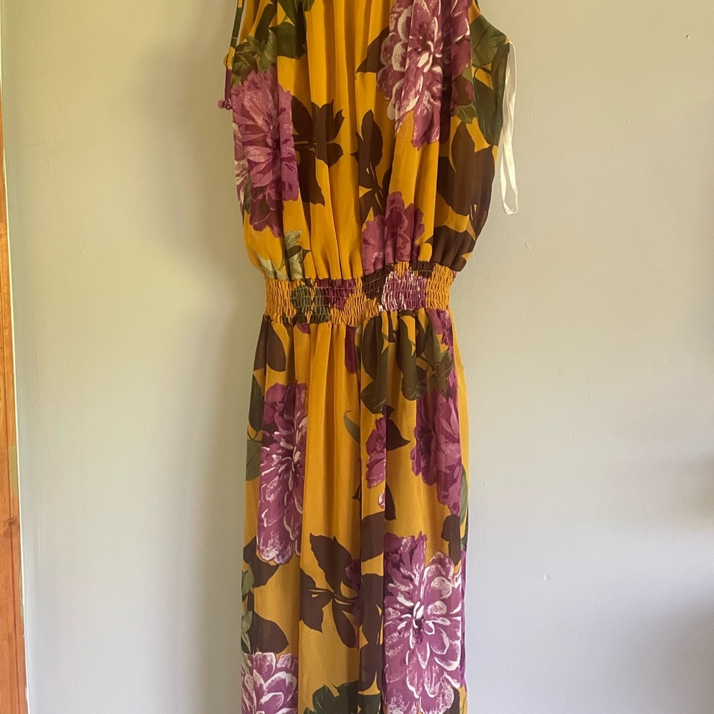 Sweet Storm floral jumpsuit Size M
